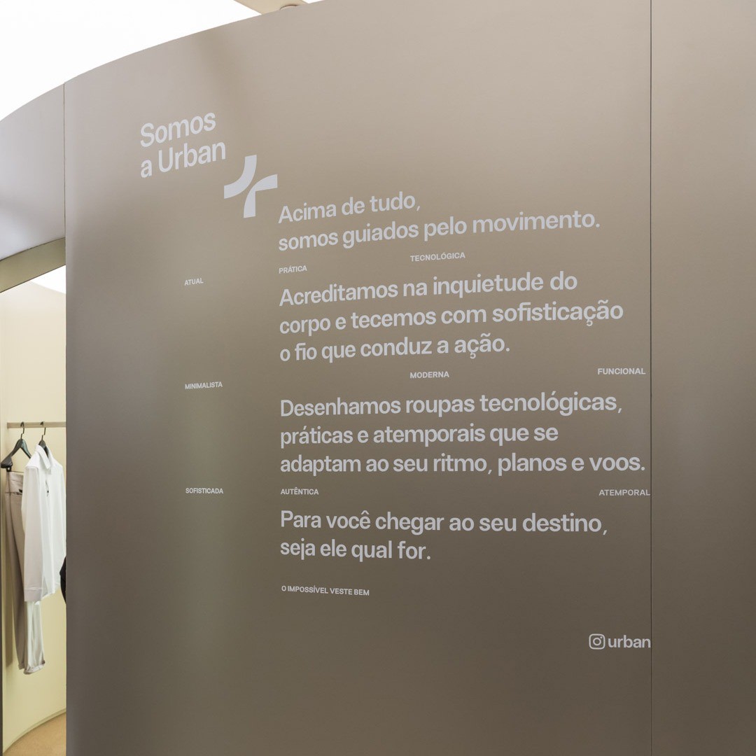 Anders brand wordmark in white placed on top of an image of a modern interior design.